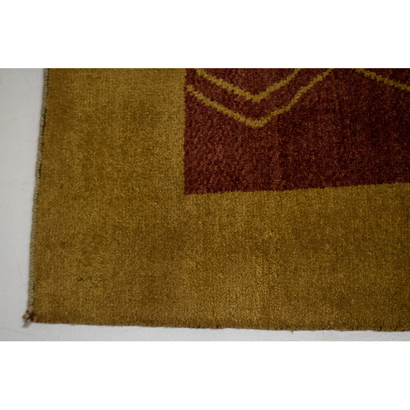 Tapis géométrique rouge brique en laine noué à la main