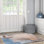 Tapis beige et bleu tissé à la machine