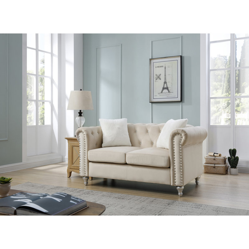 Causeuse élégante beige avec touche moderne