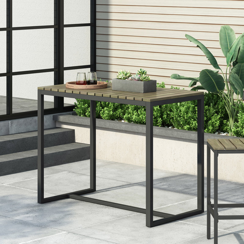 Table de bar gracieuse en bois avec structure en métal noir pour le patio