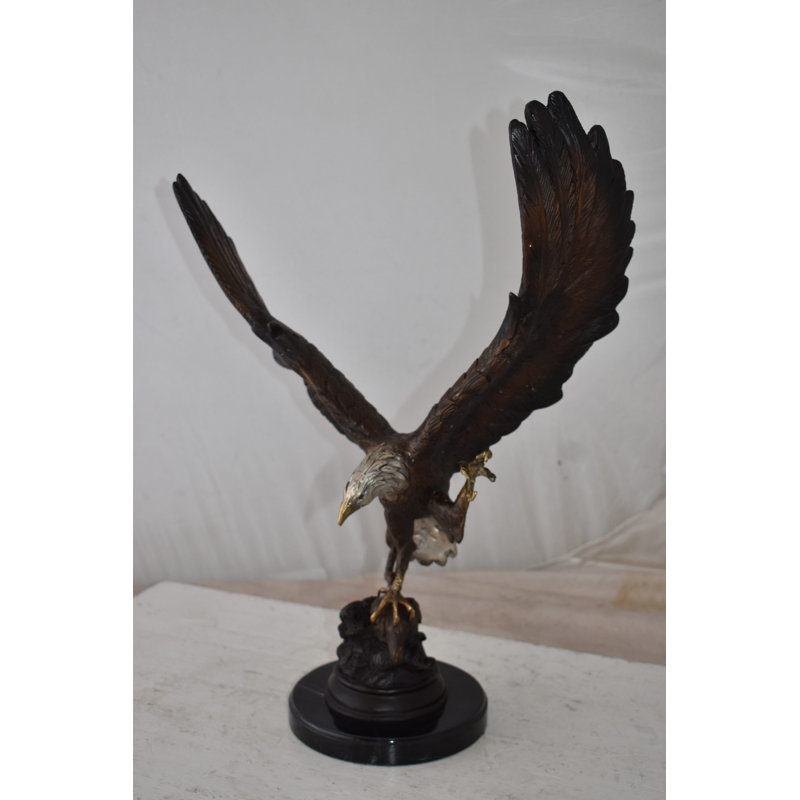 Henjes Eagle In Action Trying to Catch His Prey Bronze Statue Size: 17" x 10" x 23"H