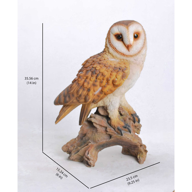 Statue hibou on branch