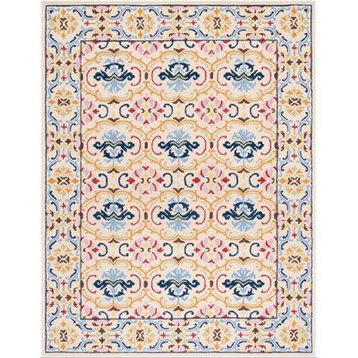 Maxcine Hand Tufted Wool/Cotton Damask Rug in Blue/Yellow/Pink