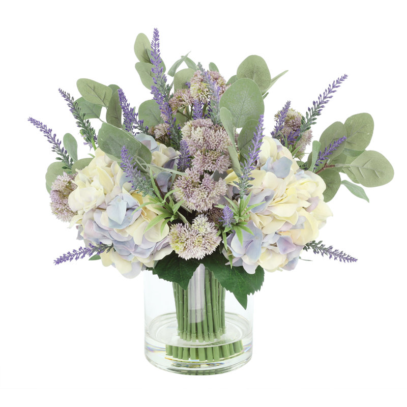Arrangement floral mixte avec hortensias, lavande et sédum