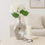 Vase décoratif en grès cérame Kato, à la silhouette sculpturale moderne et au corps ovale texturé, pour un effet contemporain saisissant.-527307974-527307981