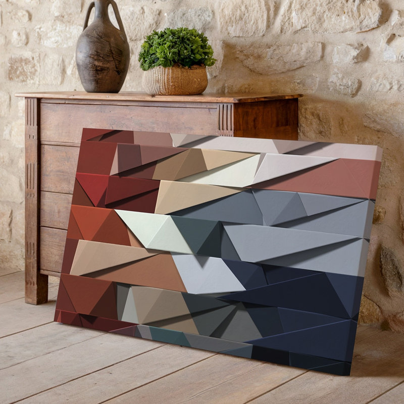 "Toile", créant un motif géométrique abstrait mettant en vedette un arrangement dynamique de formes murales triangulaires dans une couleur harmonieuse