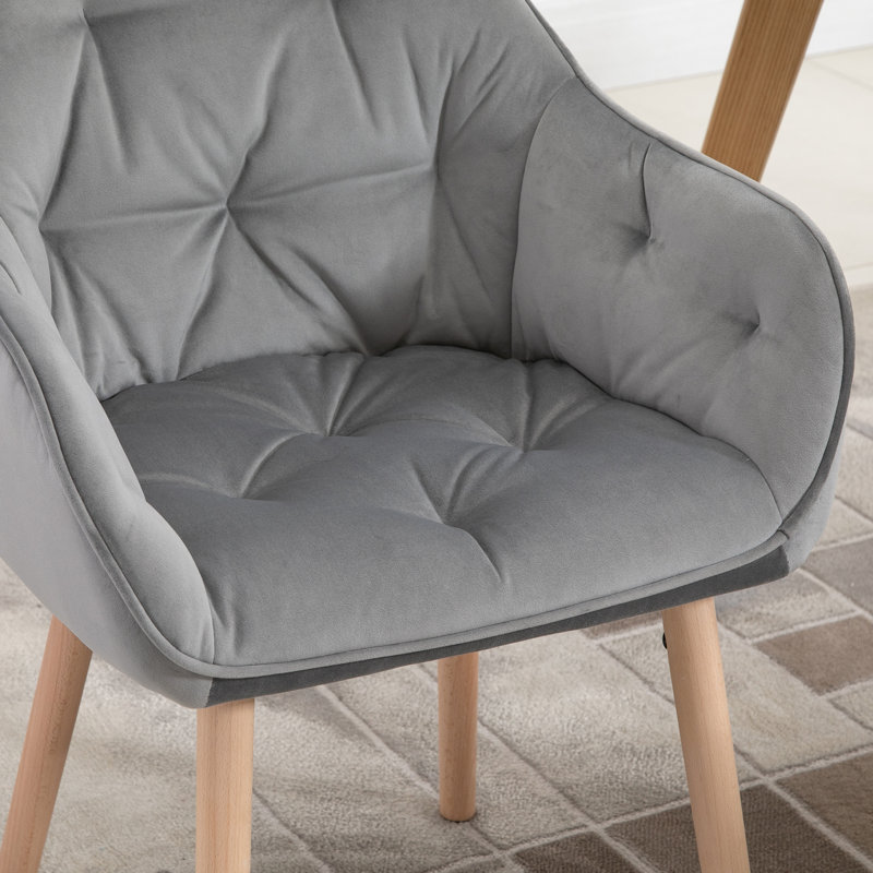 Fauteuil capitonné en velours Pedigree