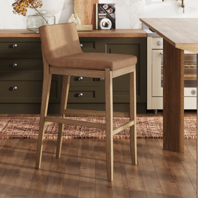 Tabouret de bar exposé avec pieds en bois massif
