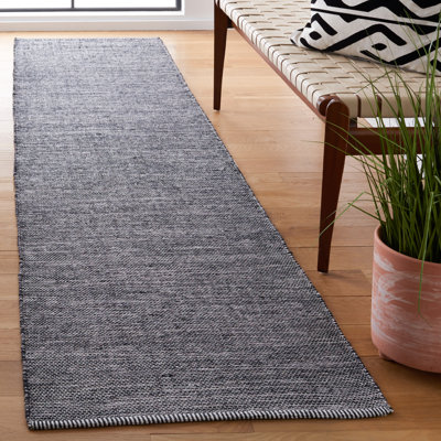 Tapis noir / ivoire en coton tissé à plat à la main Dallis
