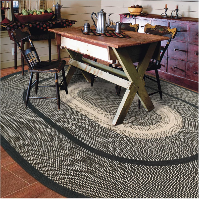 Cynthy Jute Braided Reversible Primitive Black/Tan Rug, Oval 5' x 8'