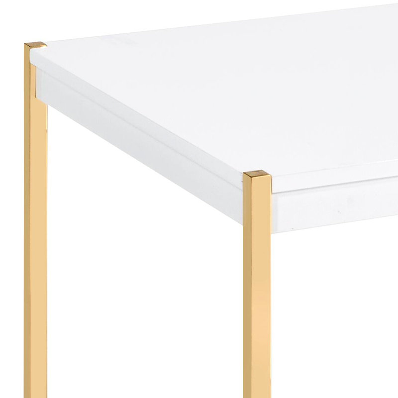 Table basse contemporaine contemporaine blanche et dorée, spacieuse et élégante avec pieds en métal pour le salon, offrant des supports de pieds stables