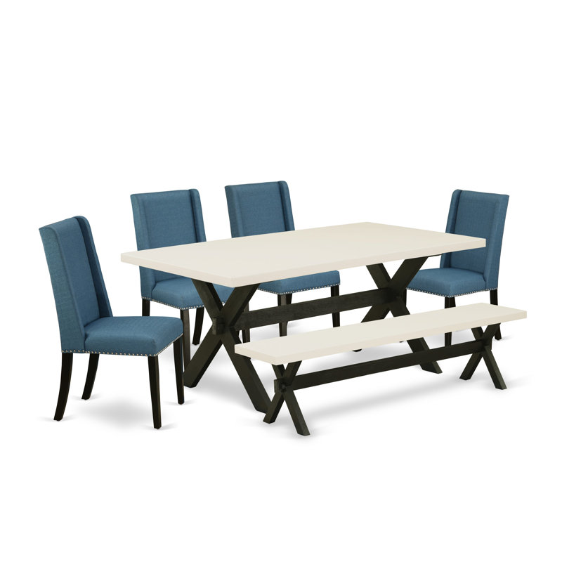 L'ensemble de salle à manger 6 pièces contient une table de salle à manger rectangulaire avec des pieds en X et 4 chaises Parson en tissu bleu avec un banc, finition noire brossée