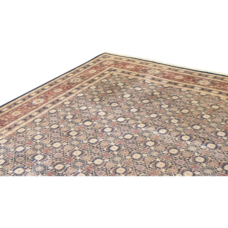 Tapis bleu marine et vin de haute qualité noué à la main