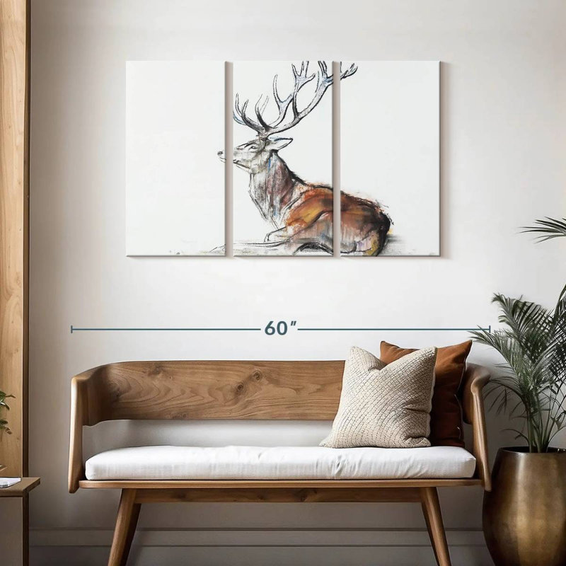 Cerf assis, H 28 po x l 45 po