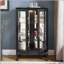 Vitrine lumineuse avec portes en verre trempé et dossier en miroir - Noir