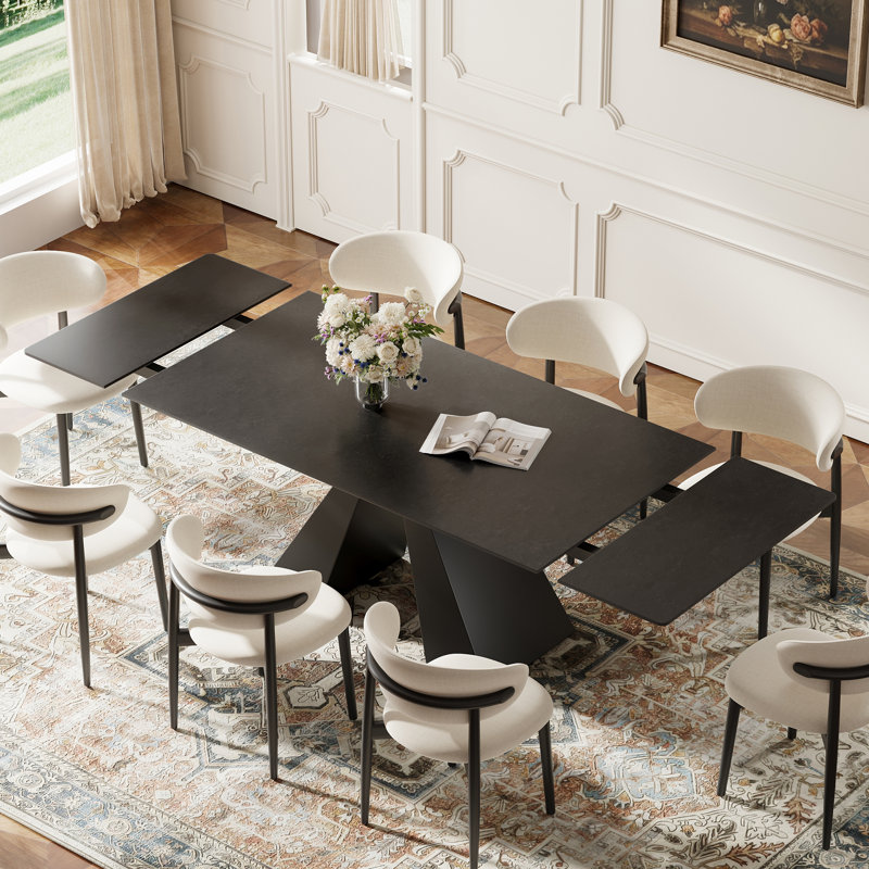 63"–94.5" Modern Extendable Dining Table with Black Sintered Stone Top and Carbon Steel Pedestal Base