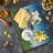 Ambesonne Easter Tempered Glass Cutting Board Eggs on the Hills Spring Multicolor