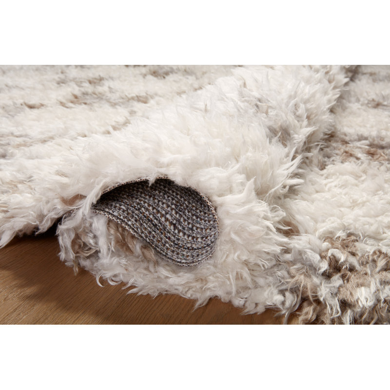 Ivory and Pebble Geometric Synthetic 7'-10" x 10' Area Rug