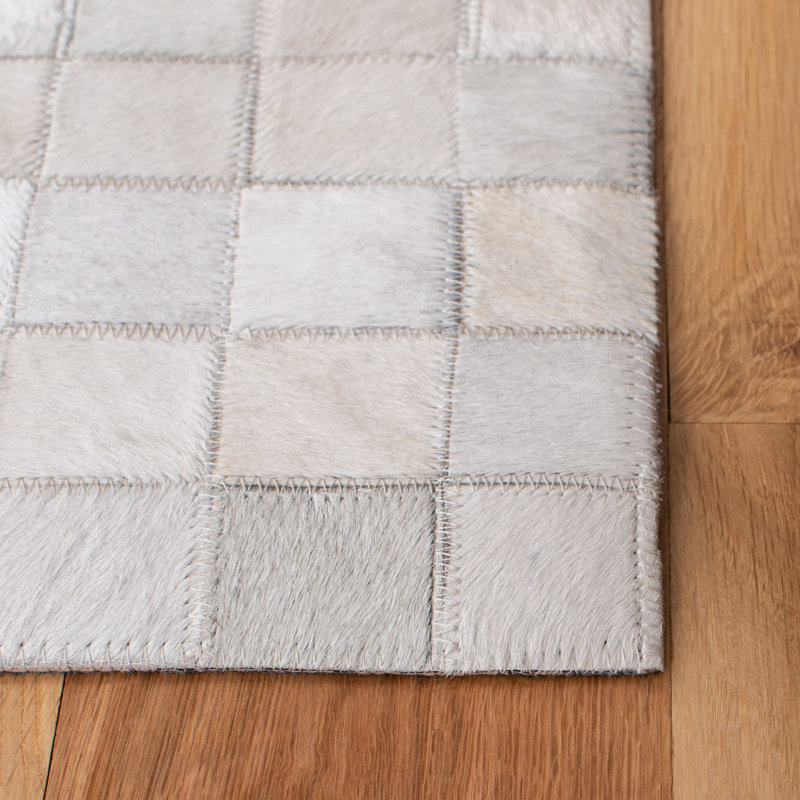 Carlino Hand Woven Leather/Felted Cloth Abstract Rug in Ivory/Black, Rectangle 5' x 8'