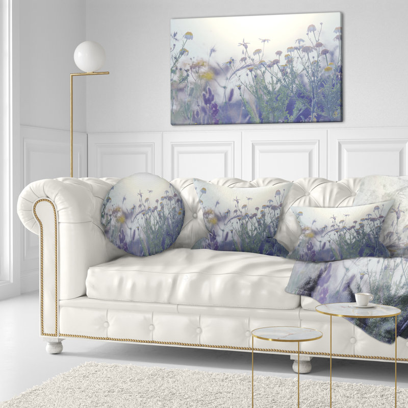 Coussins de soleil et de fleurs d’été dans un coussin lombaire