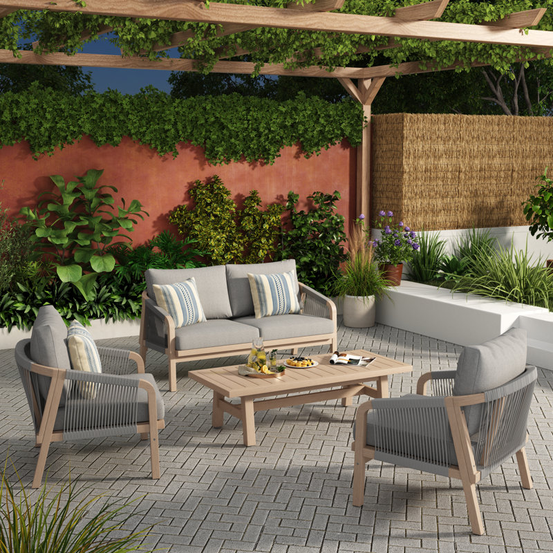 Ensemble de conversation pour 4 personnes en bois d'acacia avec coussins et table