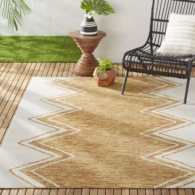 Tapis intérieur / extérieur ivoire / moutarde Nicole Miller