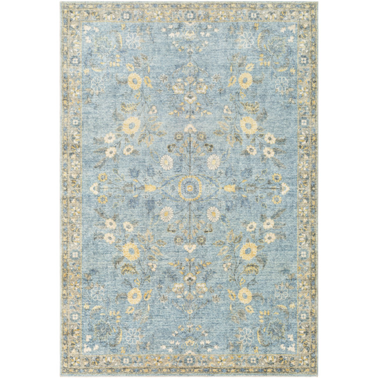 Tapis bleu à motif floral Berger