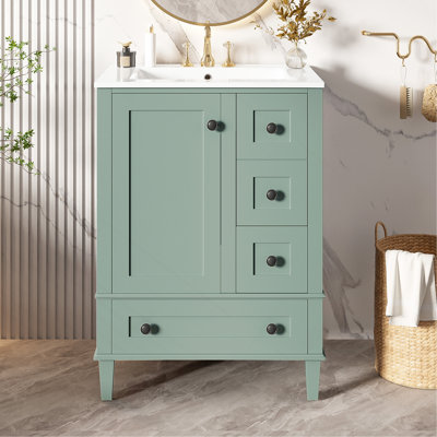 24-inch light green bathroom vanity with an integrated ceramic basin, featuring a door-mounted double-layer shelf, soft-Close Drawers and a soft-close Cabinet door