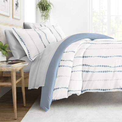 Ensemble de literie réversible 8 pièces - Housse de couette à motif, insert d'édredon et ensemble de draps unis
