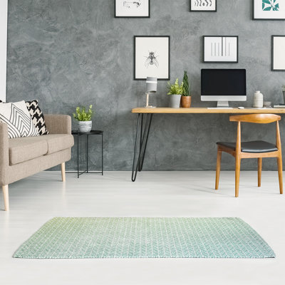 Tapis bleu turquoise moyen chevrons