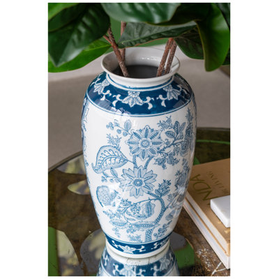 Vase en porcelaine D7.5x15 "avec motifs floraux bleus et blancs