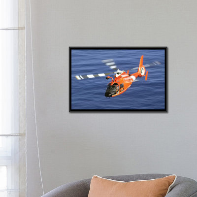 « a coast guard hh-65a dauphins rescueing hélicoptère », reproduction de photo sur toile