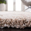 Tapis à poil long de couleur unie Performance Angeliya-19276469