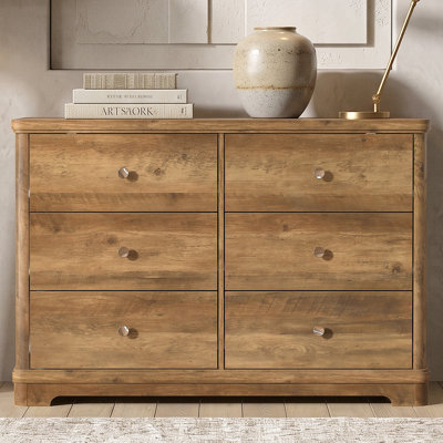Commode 6 tiroirs avec base sculptée en bois massif Burkhart