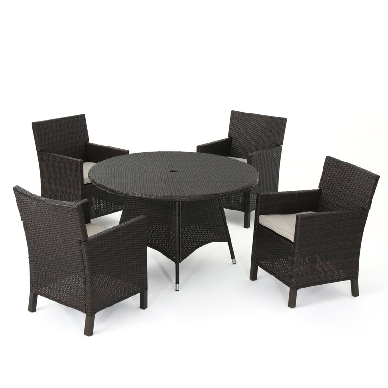 Basabi 4 - Person Patio Dining Set with Round Table , Cushions Included, Brown