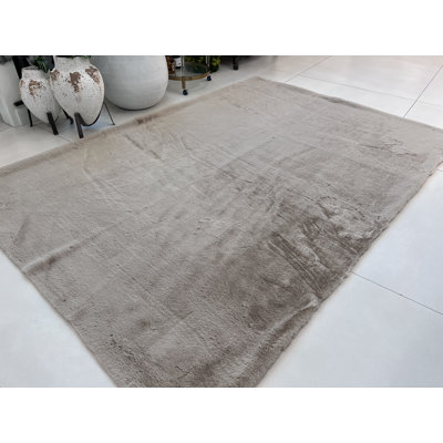 Feridun Solid Colour Machine Wash Faux Fur Vegan  Indoor Area Rug in Beige