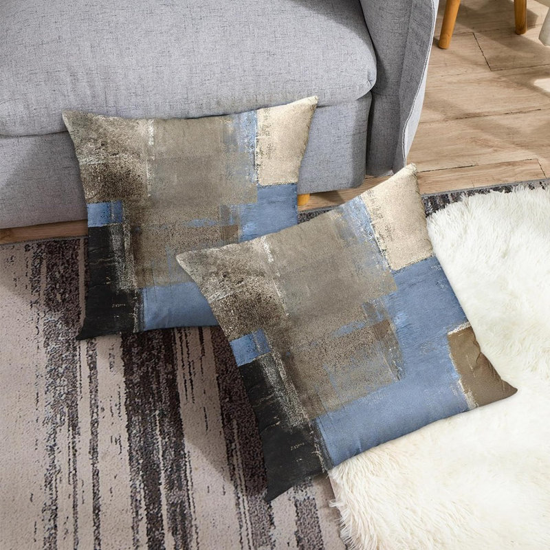 Housses de coussin bleues et beige