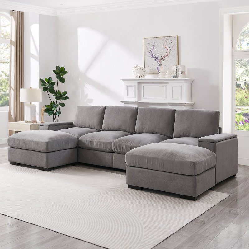 Canapé modulaire à assise profonde avec repose-pieds, revêtement en velours côtelé pour plus de confort et de polyvalence dans les salons et les bureaux