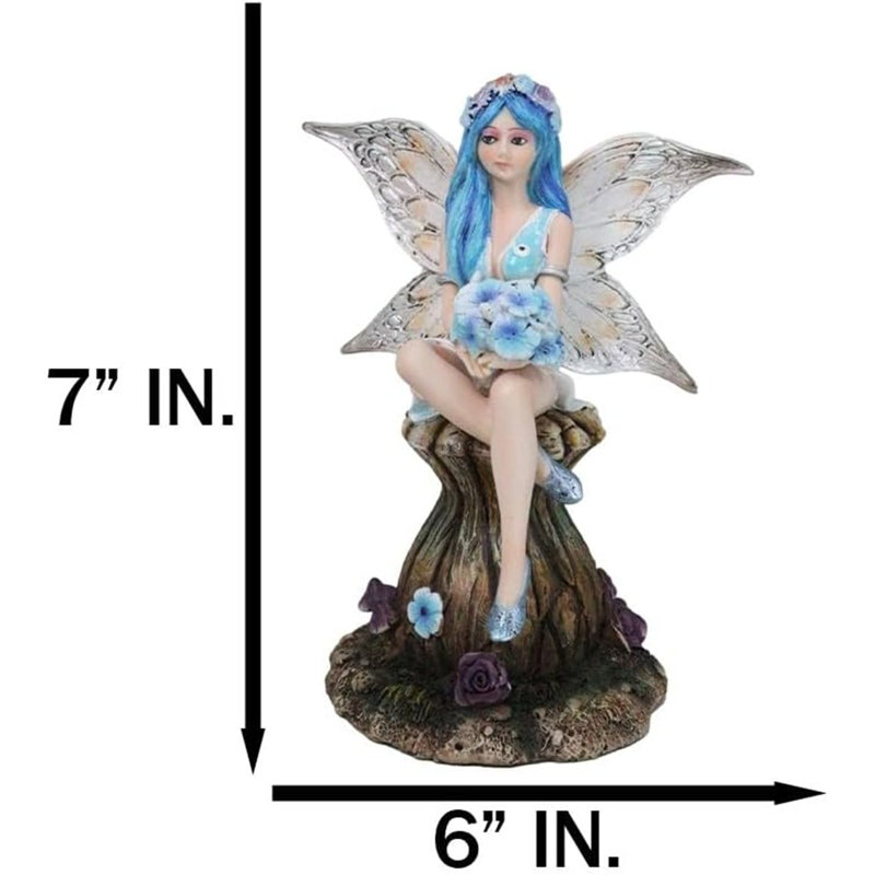 Figurine fée Pensy avec des ailes de papillon assis sur un champignon 7 "