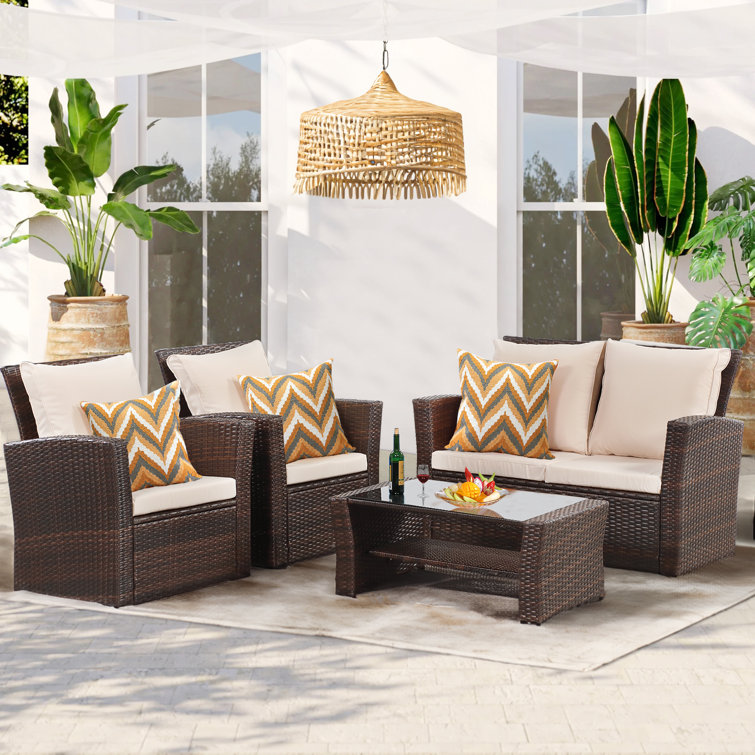 Sabna 25.6'' Wide Outdoor Wicker Patio Sofa with Cushions Ebern Designs Cushion Color: Beige