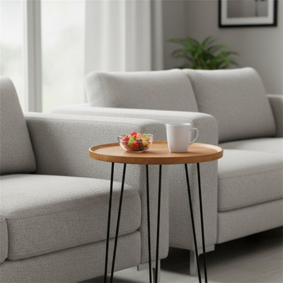 A Modern Minimalist Coffee Table With An Ironwork Support Structure, Featuring A Recessed Design To Prevent Items From Sliding Off.