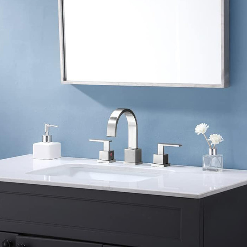 Robinet de salle de bain à large entraxe avec bonde