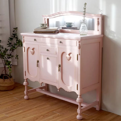 Commode rose en bois massif avec