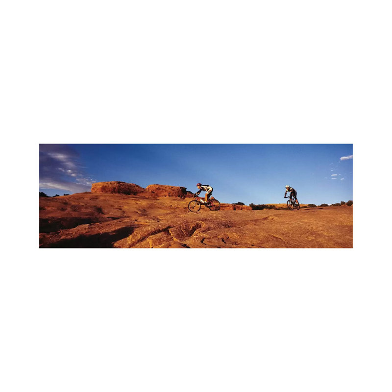 Two People Mountain Biking, Moab, Utah, USA by Panoramic Images - Wrapped Canvas Panoramic Print