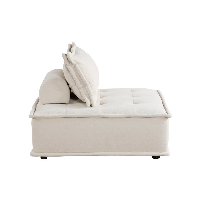 Fauteuil d'appoint capitonné beige avec coussin traversin, siège modulaire sans accoudoirs moderne, structure en bois massif