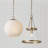 13.75" W x 15.25" H 1-Light Globe Pendant in Matte Brass with Faux Alabaster Glass and Alternating Loop Designer Chain