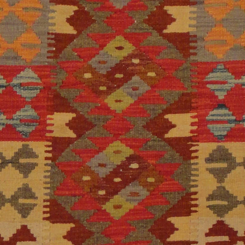 Tapis brun / rouge / vert Kilim