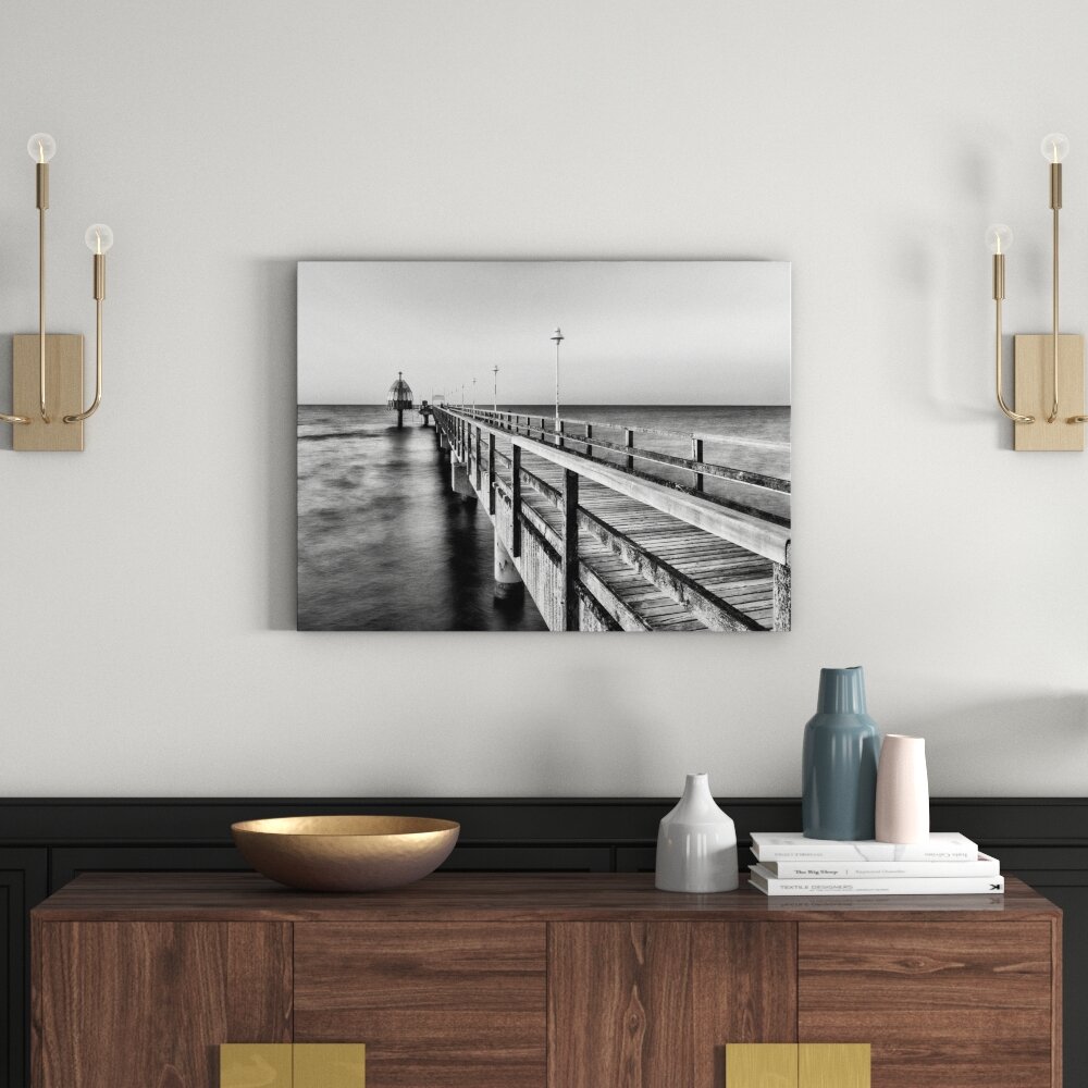 Leinwandbild Pier Steg ins Meer Sonnenuntergang Strand Wasser in Monochrom