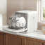 White Countertop Dishwasher with A Visible Door