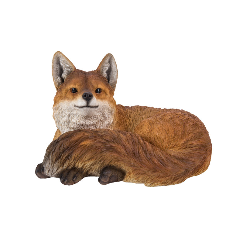 Statue renard allongé